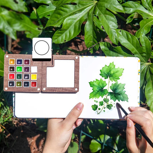 Mini akvarell festőkészlet fa dobozban – 8 szín + jegyzetfüzet, hordozható festéshez